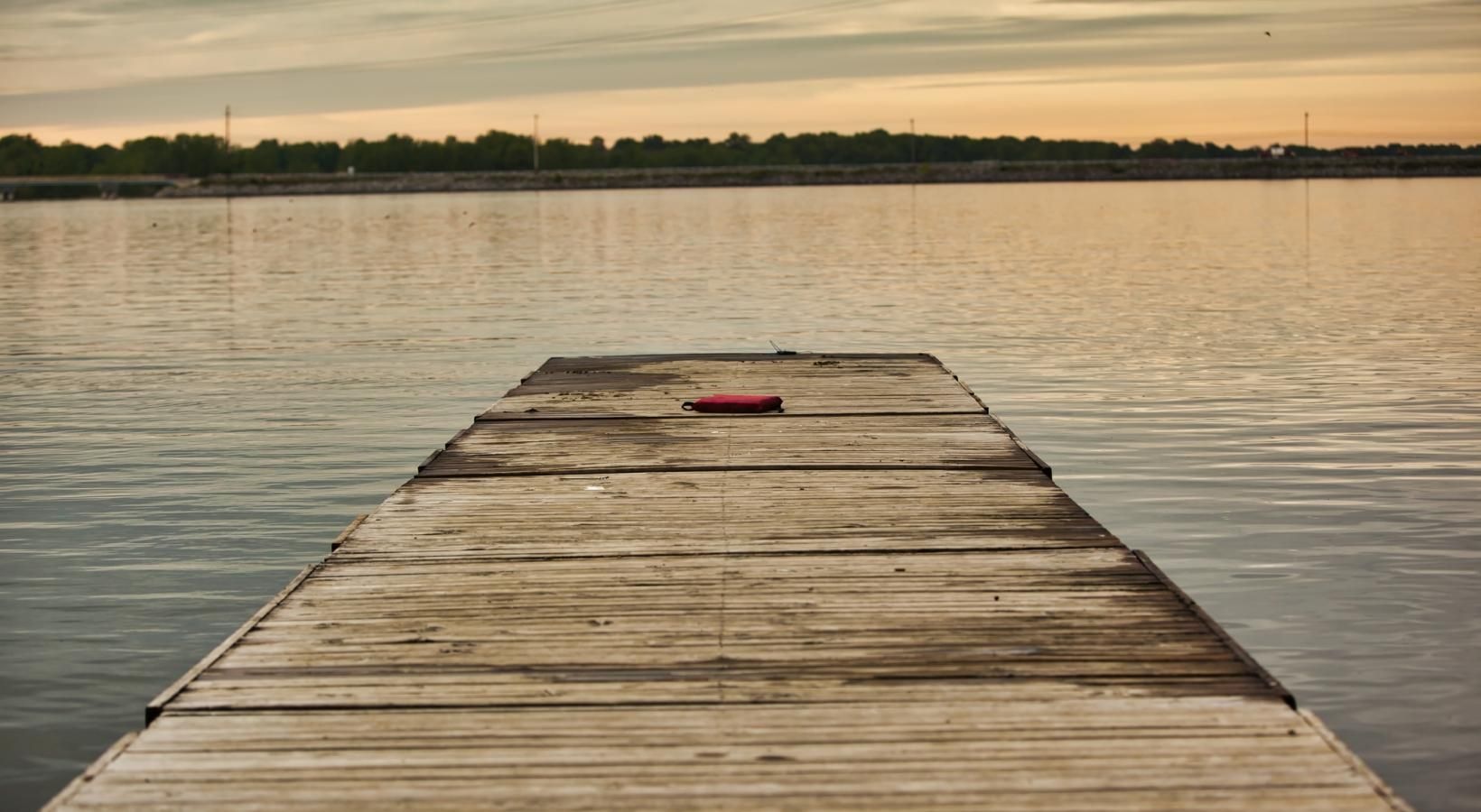 The essence of exceptional living a wood dock over water