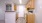a kitchen with wooden cabinets