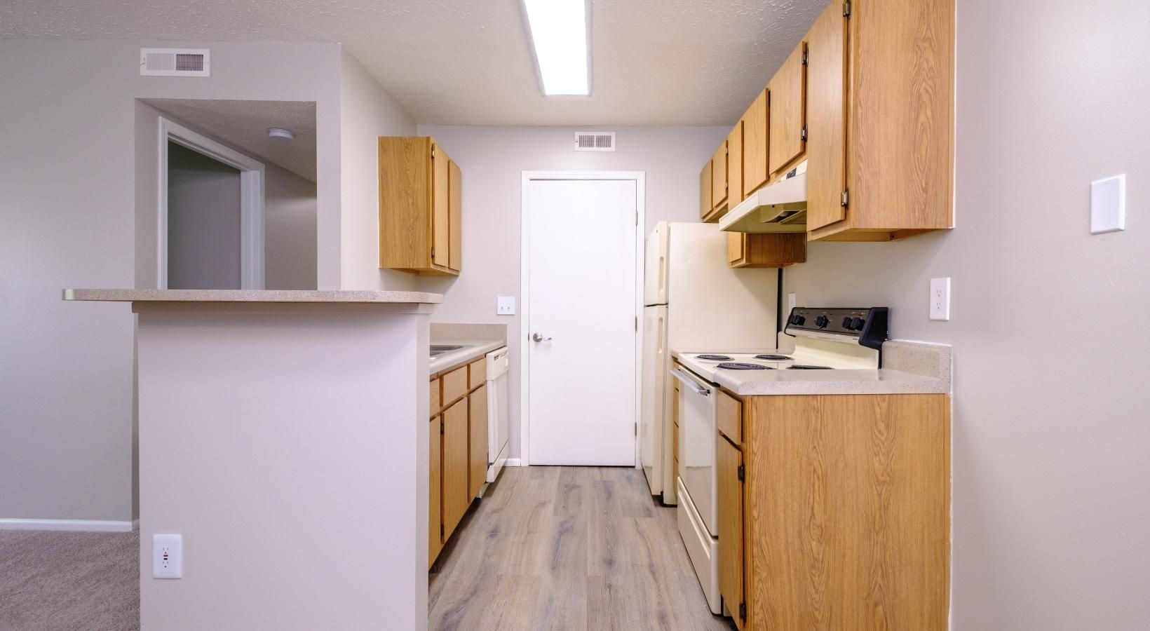 Beautiful kitchens with designer finishes a kitchen with wooden cabinets