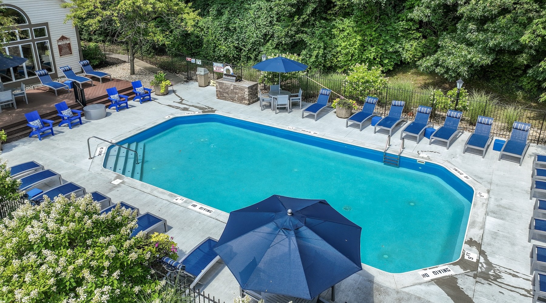 a pool with a building in the background