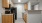 a kitchen with wooden cabinets