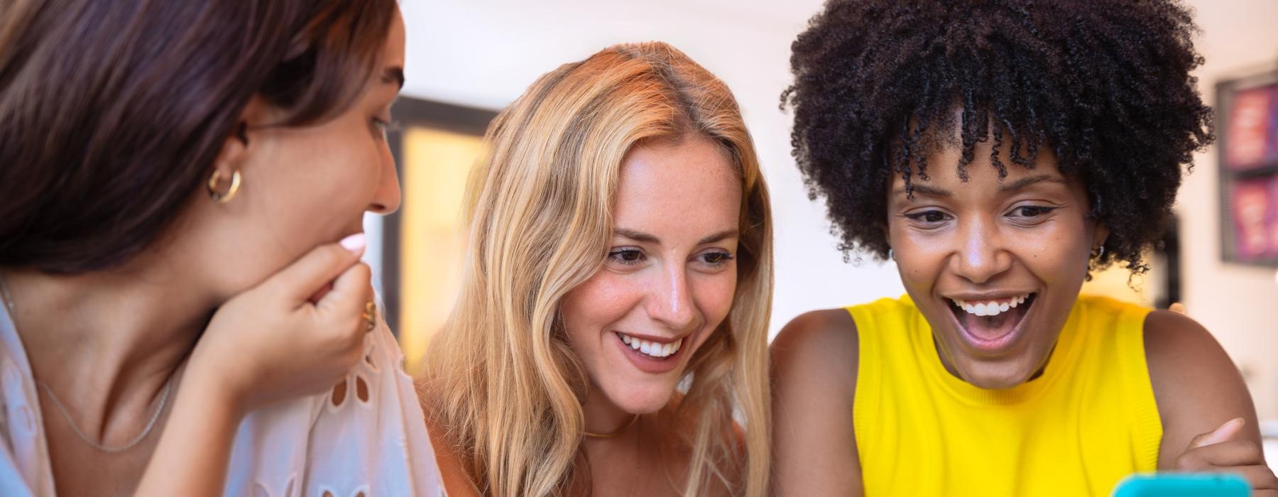 a group of women smiling
