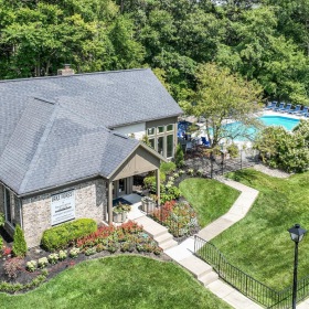 The essence of exceptional living a house with a pool and trees around it